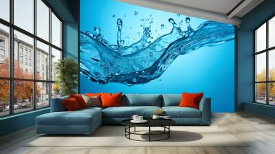 Water splash on solid blue background Wall mural