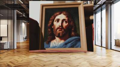 A framed painting of Jesus in a classic richly detailed library The room is filled with wooden shelves old books and vintage decor Soft lighting from a nearby lamp casts a warm glow on the painting gi Wall mural