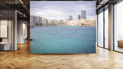 General view of the city under construction through the water barrier Wall mural