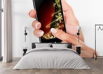 hand holding mobile phone with christmas screen over white backg Wall mural