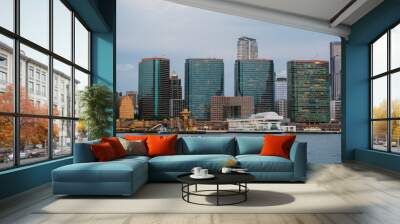 A stunning modern city skyline featuring an impressive waterfront view that captivates Wall mural