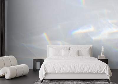  Crystal prism rainbow light refraction texture on white wall background. Organic drop diagonal holographic flare on a white wall. Water shadows for natural light overlay effects Wall mural