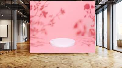 Abstract minimal nature scene - empty stage and circle podium on pink background and soft shadows of rose flowers and leaves. Pedestal for cosmetic product and packaging mockups display presentation Wall mural