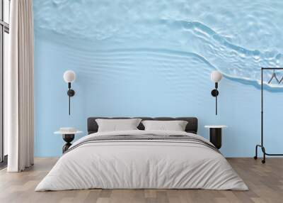 Blurred transparent blue colored clear calm water surface texture with splashes and bubbles. Trendy abstract nature background. Water waves in sunlight with copy space. Wall mural