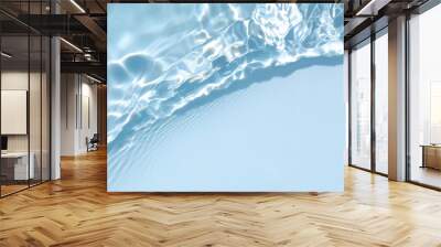 Blurred transparent blue colored clear calm water surface texture with splashes and bubbles. Trendy abstract nature background. Water waves in sunlight with copy space. Wall mural