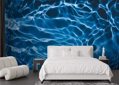 De-focused transparent dark blue colored clear calm water surface texture with splashes and bubbles. Trendy abstract nature background. Water waves in sunlight with copy space. Wall mural