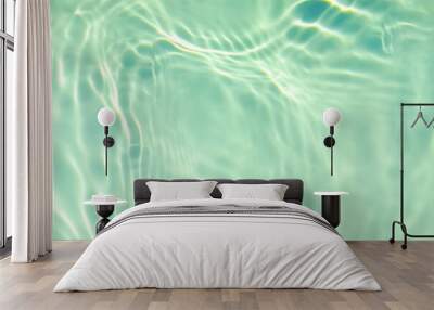 de-focused. Closeup of mint green transparent clear calm water surface texture with splashes and bubbles. Trendy abstract summer nature background. Mint colored waves in sunlight. Copy space. Wall mural