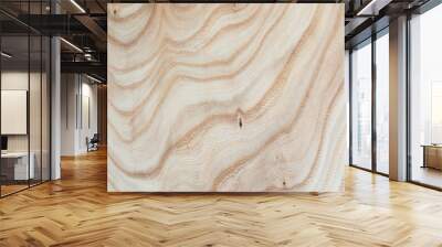 Natural beige wood texture background. Wavy textured plywood, a lot of fiber and small chips, close-up abstract tree background for design, decor and skins Wall mural