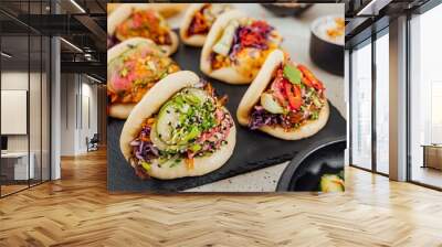 Closeup shot of steamed bao buns on a black surface Wall mural