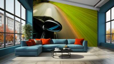 Side view of black car driving in forest. Wall mural