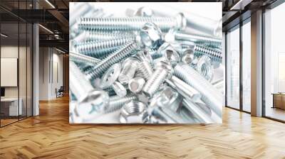 Metal bolts and nuts  in a row background. Chromed screw bolts and nuts isolated. Steel bolts and nuts pattern. Set of Nuts and bolts. Tools for work. Wall mural