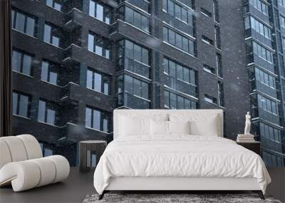 Modern building during a snowfall Wall mural