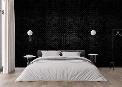 Abstract dark background of small rings in shades of black and gray colors. Wall mural