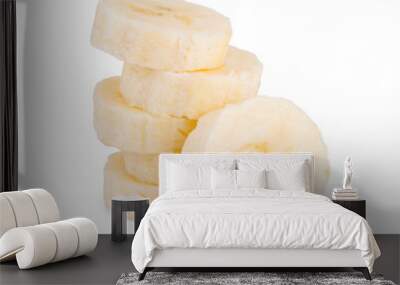 Stack pile of banana slices isolated on the white background Wall mural