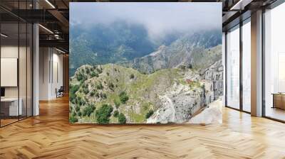 Beautiful view to Passo del Vestito from road, Italy. June 27, 2024. Wall mural