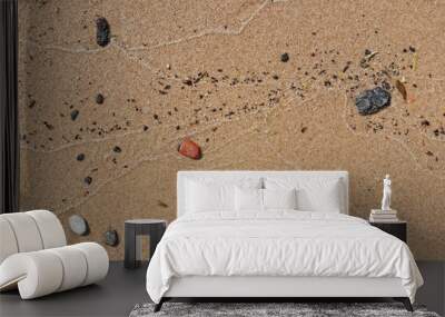 Stones on wet sand beach Wall mural