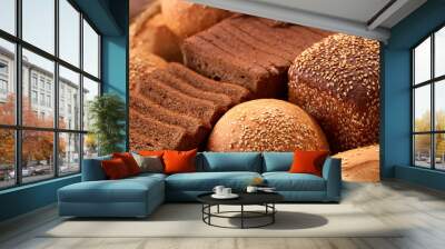 Assortement of Freshly baked traditional bread with ears of wheat Wall mural