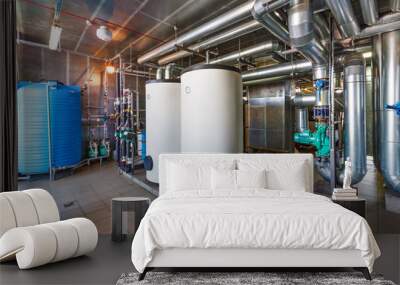 The interior of a modern gas boiler house with pumps, valves, a multitude of sensors and barrels Wall mural