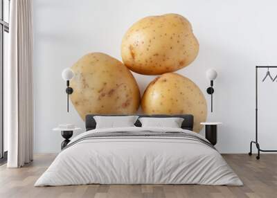 Three potatoes on a white background. Isolated Wall mural