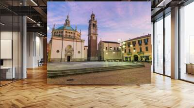 Scenic italian city at sunrise. Historic center of Busto Arsizio, street Sant'Antonio (via Sant'Antonio) with the Santuario di Santa Maria di Piazza - XVI century. City in the province of Varese Wall mural