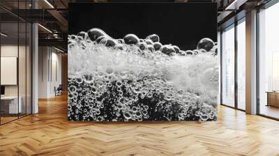 A close-up view of water bubbles on the surface Wall mural