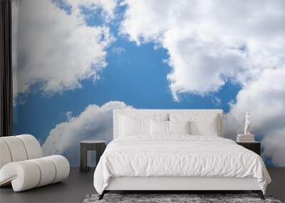 Blue sky and white cumulus clouds, natural background Wall mural