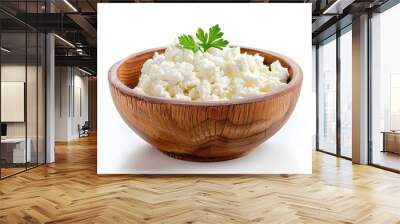 Fresh cottage cheese served in a wooden bowl with a sprinkle of parsley Wall mural