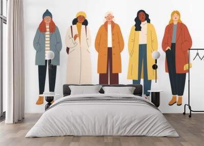 Group of modern women wearing trendy winter clothes. Casual city street fashion outfits. Hand drawn characters colorful vector illustration. Wall mural