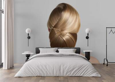 hairstyle bun back view. blonde woman portrait Wall mural