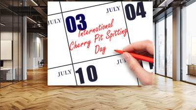 July 3. Hand writing text International Cherry Pit Spitting Day on calendar date. Save the date. Wall mural