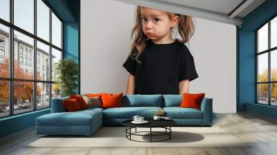 Kid girl model in black Bella Canvas 3001 mockup. Blank crewneck tshirt front view mockup. Indoor kids mockup, short sleeve t-shirt template. Preschooler, pre-k girl age 3, 4, 5 years old Wall mural