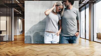 Couple in gray t-shirt over street wall Wall mural