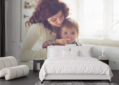 Mother and child eating in the kitchen Wall mural