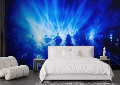 silhouettes of musicians on stage in the rays of light Wall mural