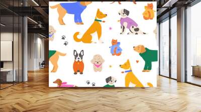 Seamless pattern with cute dogs and a cat wearing colorful winter outfits. Colorful hand drawn background vector illustration. Wall mural