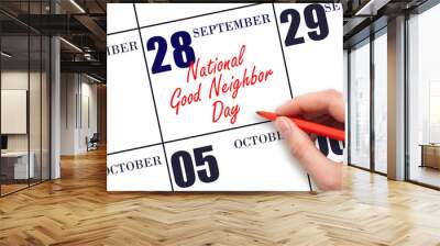 September 28. Hand writing text National Good Neighbor Day on calendar date. Save the date. Wall mural