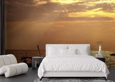 loving couple on beach at sunset Wall mural