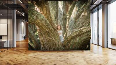 outdoor portrait of young child girl in magic forest, outdoor natural background Wall mural