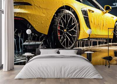 Yellow modern car in carwash. Sport car cleaning, wheel detail. Wall mural