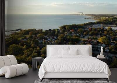 Aerial drone view of suburban neighborhood on the shoreline of Lake Michigan. Establishing shot of American suburb, street. Residential houses in Milwaukee, Wisconsin Wall mural