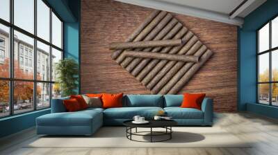 Cigarillo on wooden background Wall mural