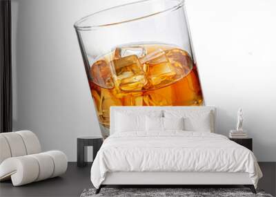 whiskey glass with ice on white Wall mural