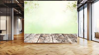 Wood table top on blur white green Wall mural