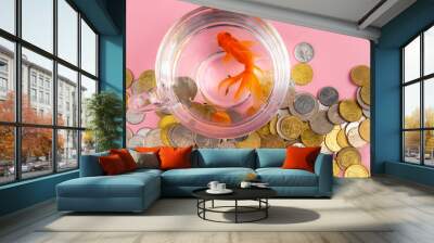 Coin, Red alarm Clock and Gold fish inside a bowl . Time is money Concept, Business Concept.  Wall mural