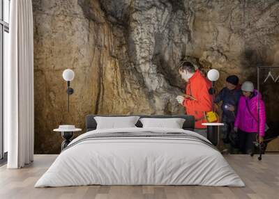 Tourists in the Krizna cave in Slovenia Wall mural