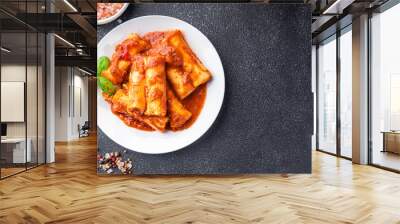 cannelloni pasta dish stuffed with meat tomato sauce healthy meal food snack diet on the table copy space food background rustic top view Wall mural