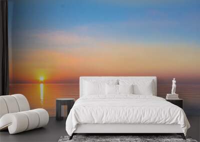 landscape - sunset on the coast, waves, horizon. top view. Wall mural