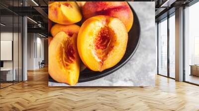 nectarine or peach sweet fruit natural dessert sweets meal snack on the table copy space food background rustic. top view keto or paleo diet veggie vegan or vegetarian food Wall mural