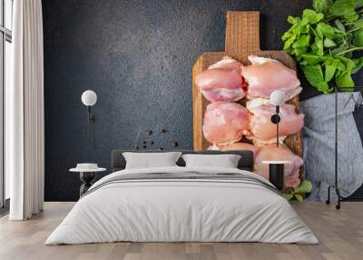 raw chicken thigh boneless pulp meat poultry or turkey fresh ready to eat meal snack on the table copy space food background rustic. top view keto or paleo diet Wall mural