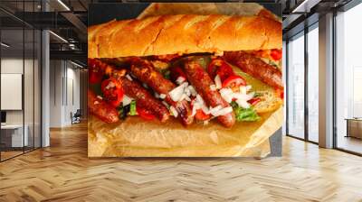 sausage hot dog, bun, greens, sauce fast food delicious food dish Fresh delicious gourmet food background on the table rustic food top view copy space Wall mural